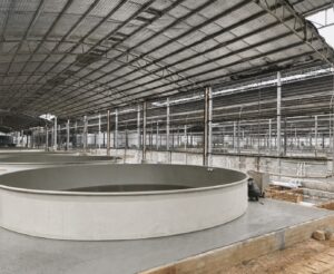 Round PP tank in a fabrication hall