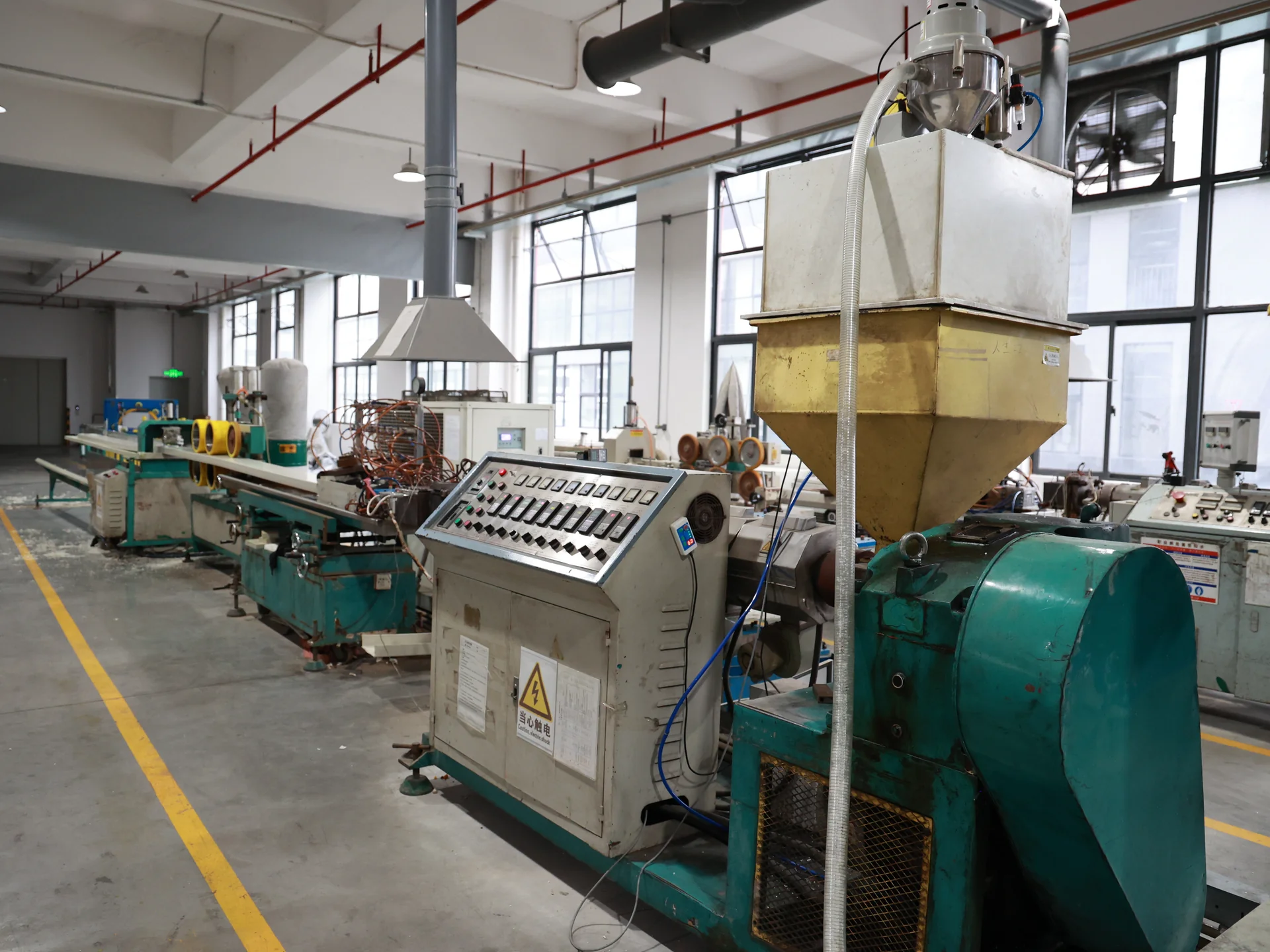 PP profile extrusion line in a QEEHUA workshop